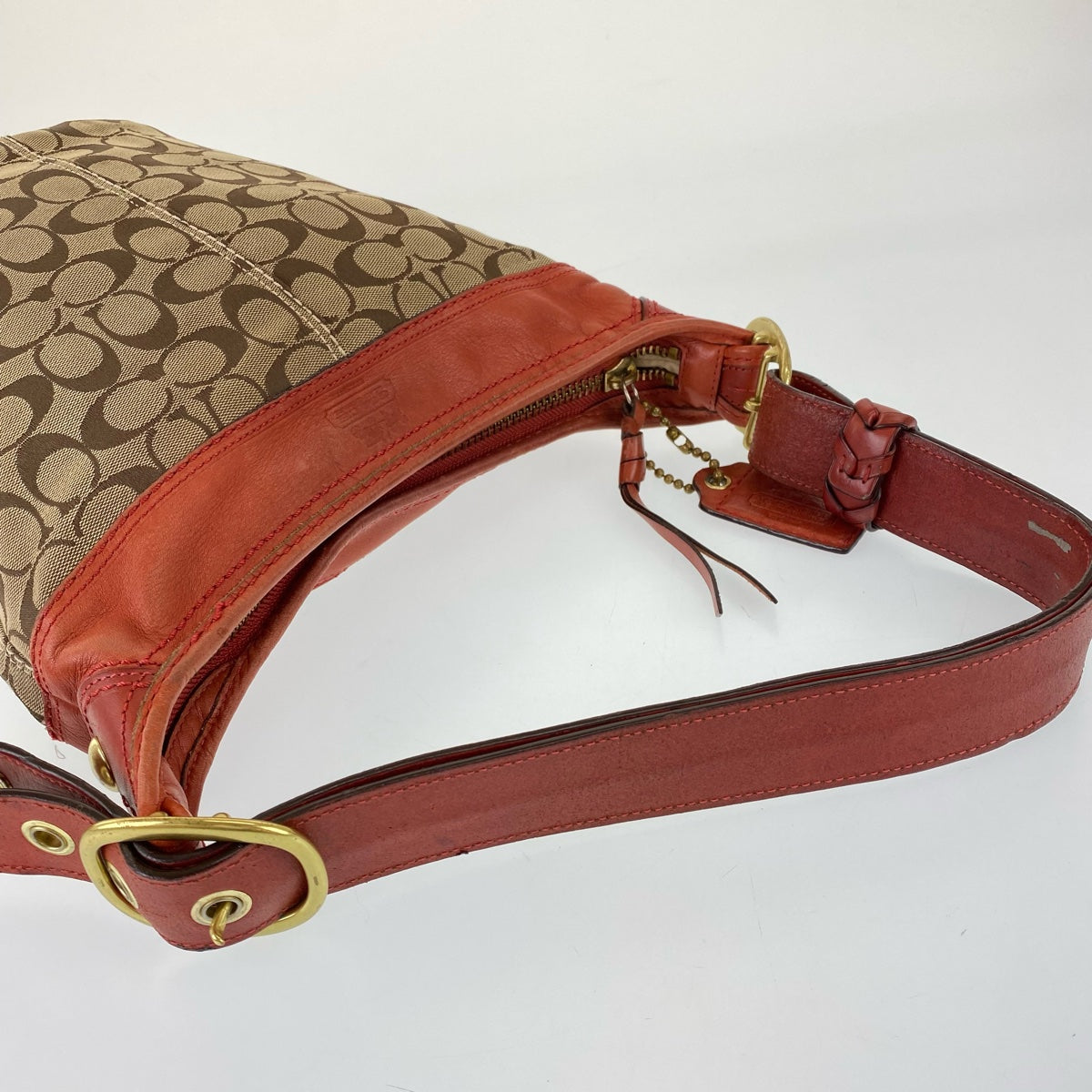 12765
COACH コーチ シグネチャー ブラウン オレンジ キャンバス / レザー L0793-11437 ホーボー ショルダーバッグ ダッフルバッグ レディース