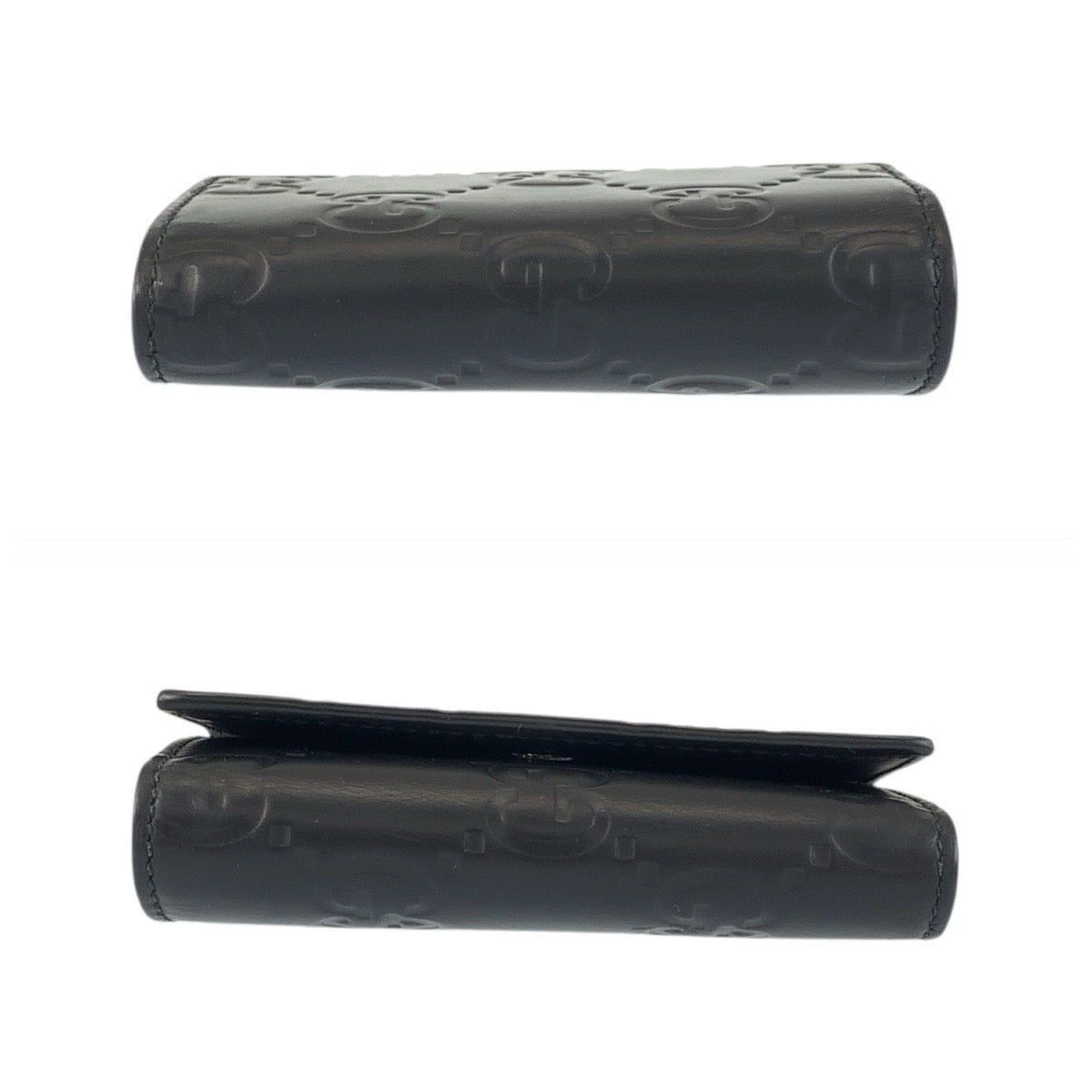 21957
GUCCI グッチ ラバーエフェクト ブラック 黒 レザー 771312 キーケース 6連 メンズ ABP20