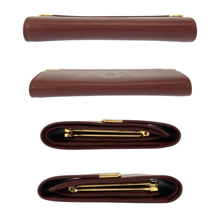 24902
CARTIER カルティエ マストライン ボルドー ゴールド金具 レザー 折財布 コンパクトウォレット レディース A23