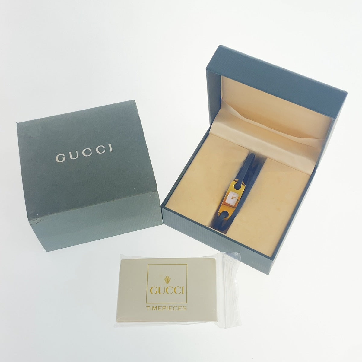 GUCCI グッチ ヴィンテージ ゴールド ブラック ホワイト メタル / レザー 6100L 腕時計 クオーツ ブラック文字盤 レディース AB19