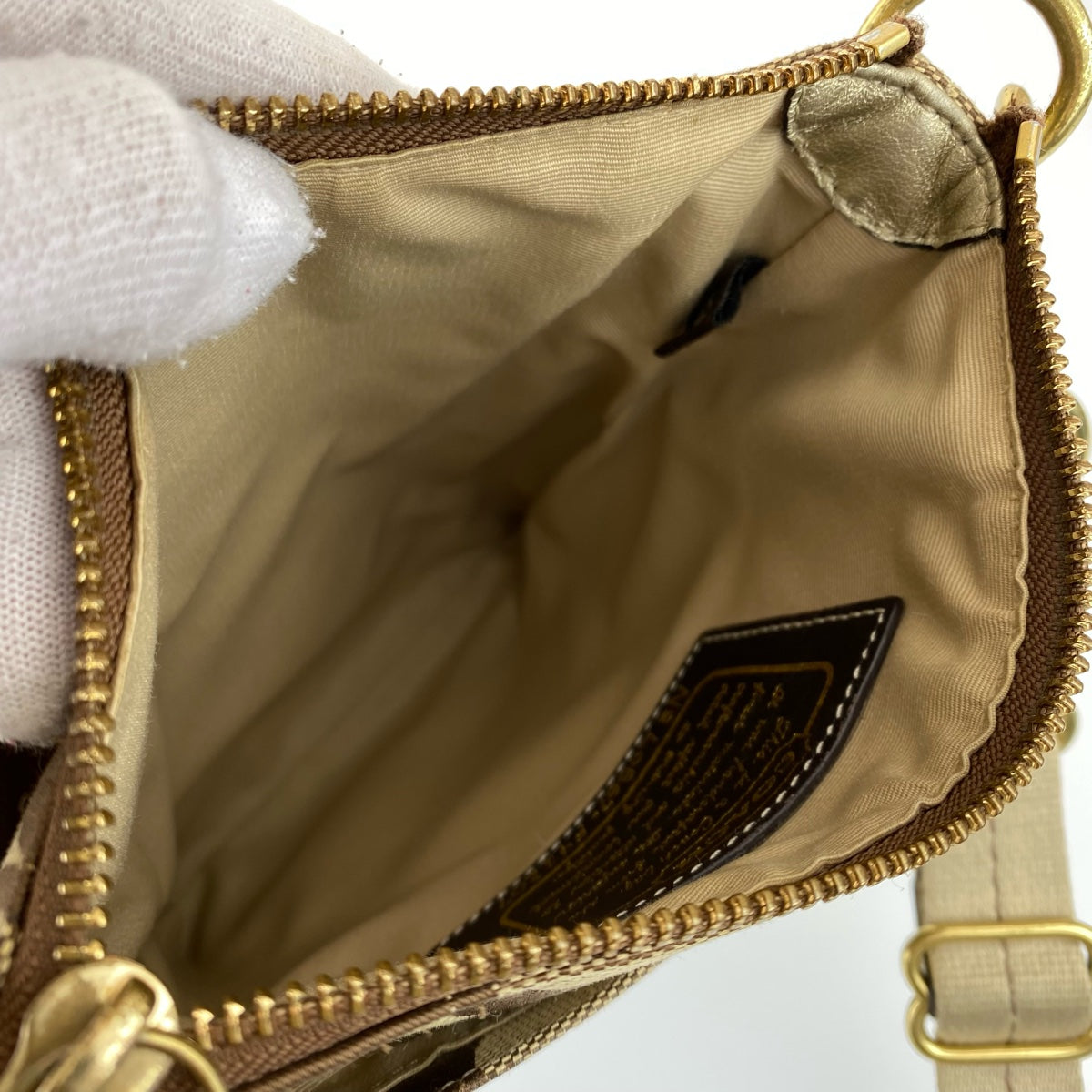 12762
COACH コーチ シグネチャー 斜め掛け可能 ブラウン キャンバス Lo867-F41207 ショルダーバッグ ポシェット  レディース AB5