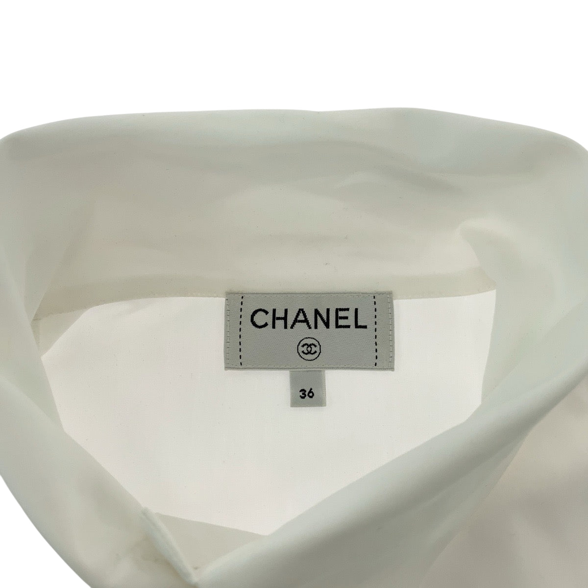 180
CHANEL シャネル ココマーク スパンコール パール サイズ36 ホワイト シルバー金具 ポリエステル P70673V48585 長袖シャツ ドレスシャツ レディース A148