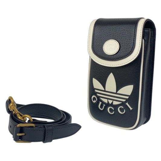 10868
 GUCCI Gucci Adidas collaboration unisex black white gold hardware leather shoulder bag phone case pochette men's