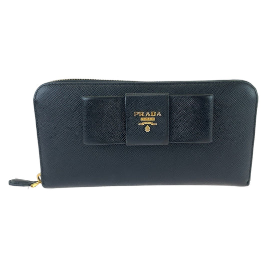 12468
PRADA プラダ サフィアーノ リボン ブラック ゴールド金具 レザー 1ML506 長財布 ラウンドジップ  レディース
