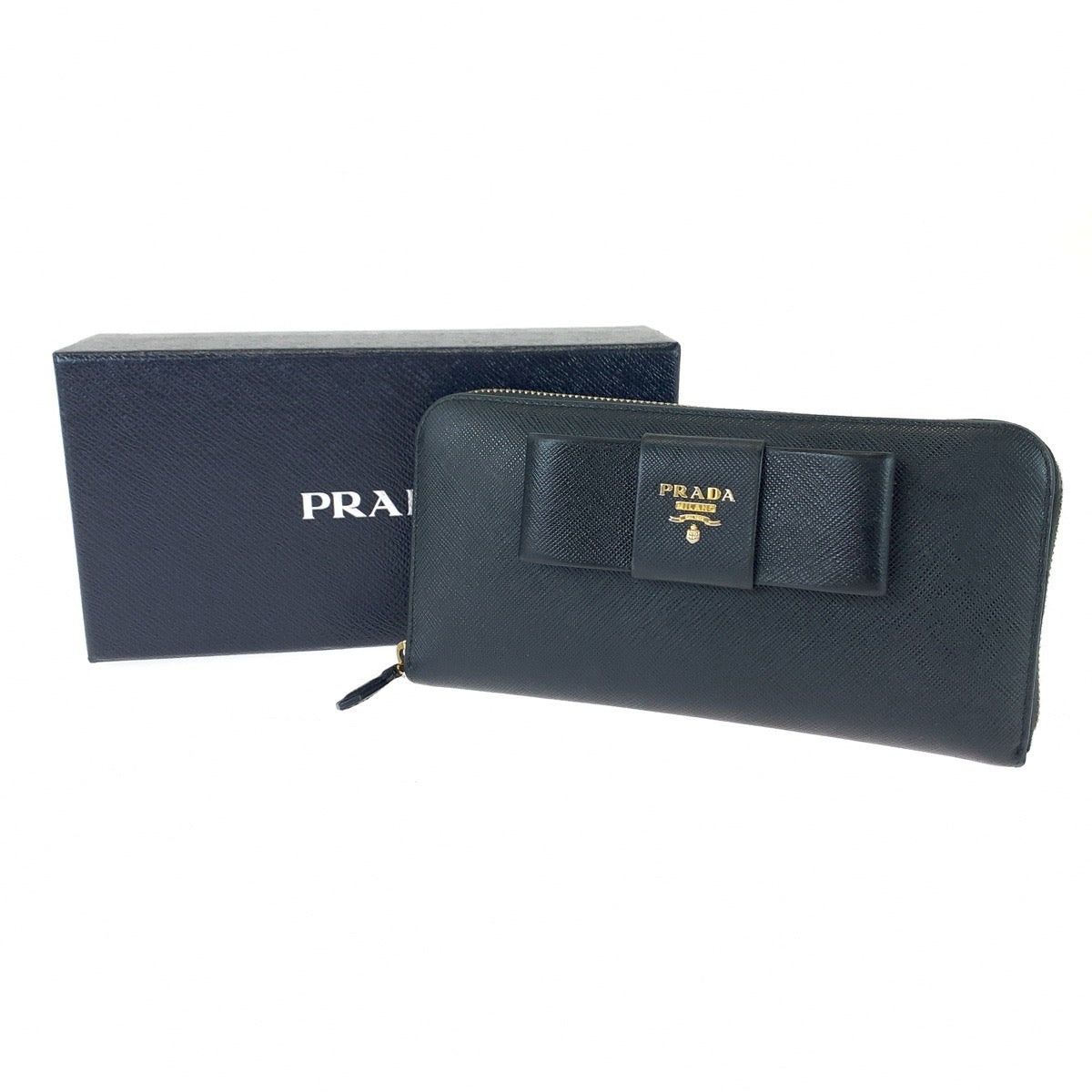 12468
PRADA プラダ サフィアーノ リボン ブラック ゴールド金具 レザー 1ML506 長財布 ラウンドジップ  レディース