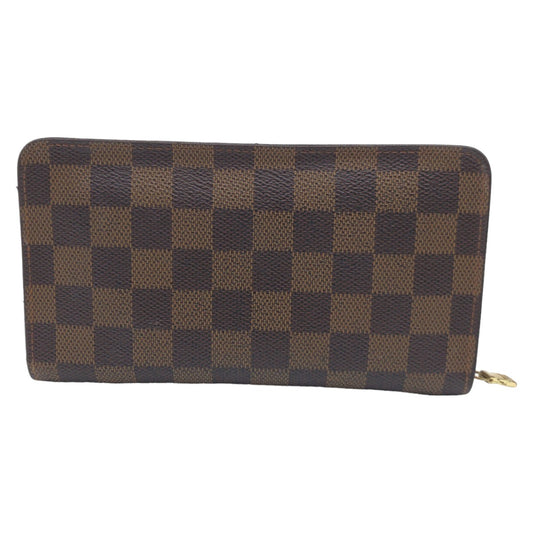 10789
LOUIS VUITTON ルイヴィトン ダミエ エベヌ ポルトモネジップ ブラウン ゴールド金具 PVC N60015 長財布 ロングウォレット ジッピー  レディース