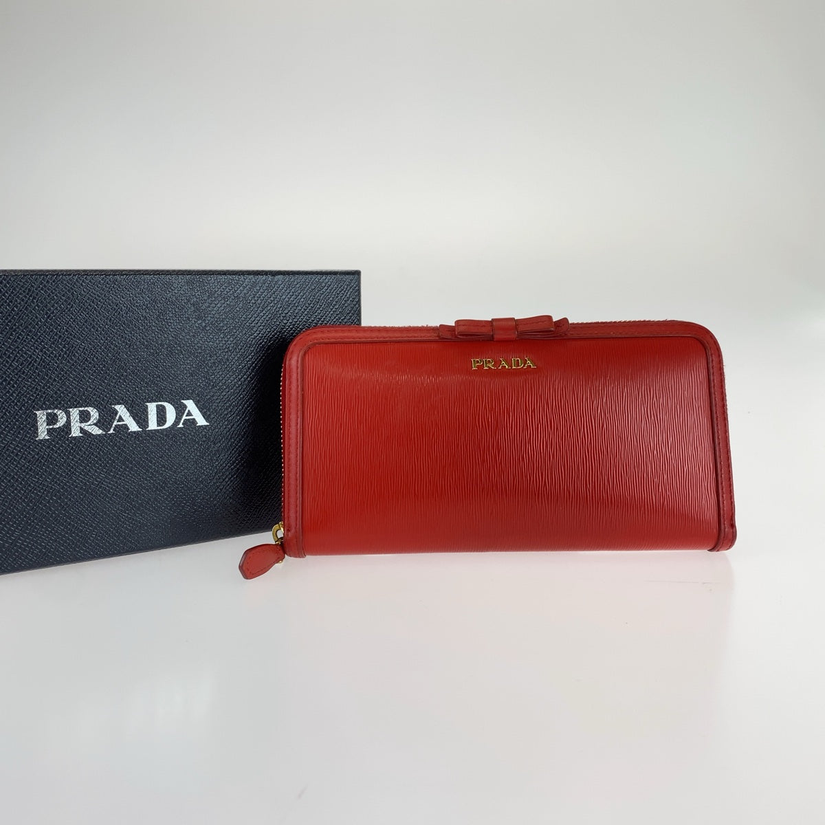 12456
PRADA プラダ リボン レッド ゴールド金具 レザー 長財布 ロングウォレット  レディース