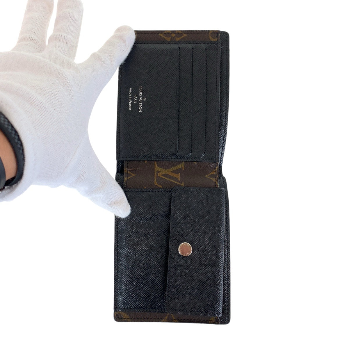 12947
LOUIS VUITTON ルイヴィトン モノグラム マカサー ポルトフォイユ ミンドロ ブラウン ブラック シルバー金具 PVC / レザー M60411 折財布 コンパクトウォレット  メンズ