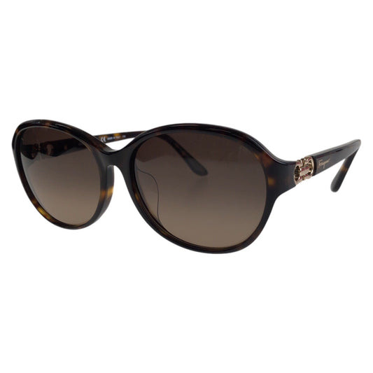 13590
Salvatore Ferragamo サルヴァトーレフェラガモ ガンチーニ 琥珀柄 ブラウン ゴールド金具 プラスチック SF804SA 214 5616 135 サングラス 男女兼用 オーバル  レディース