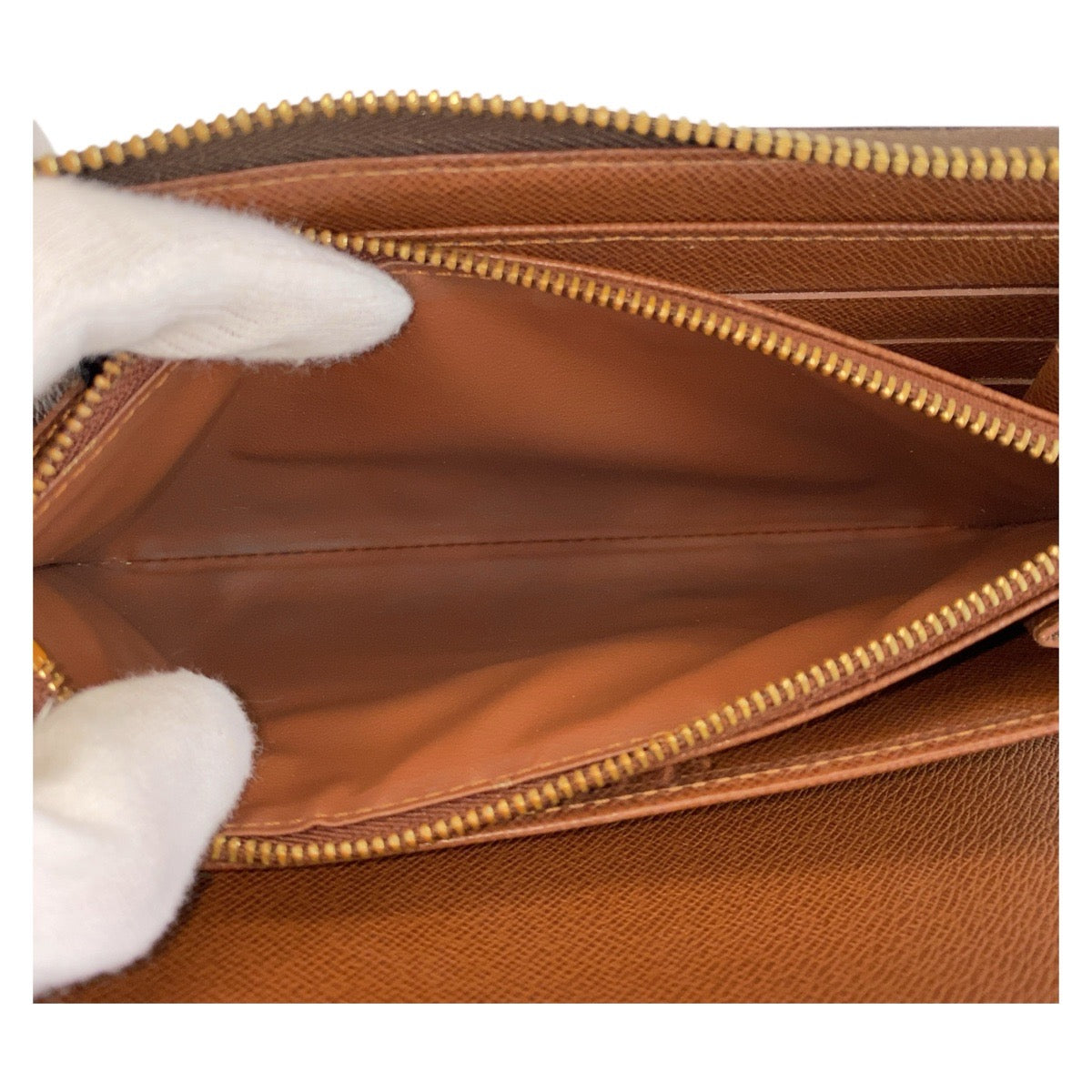 14194
LOUIS VUITTON ルイヴィトン モノグラム ジッピー オーガナイザー ブラウン ゴールド金具 PVC M60002 長財布 ロングウォレット  メンズ