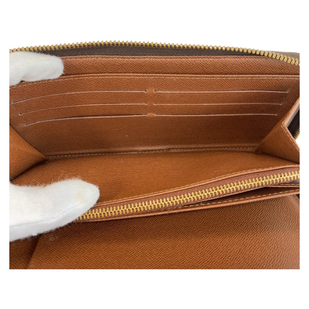 14194
LOUIS VUITTON ルイヴィトン モノグラム ジッピー オーガナイザー ブラウン ゴールド金具 PVC M60002 長財布 ロングウォレット  メンズ