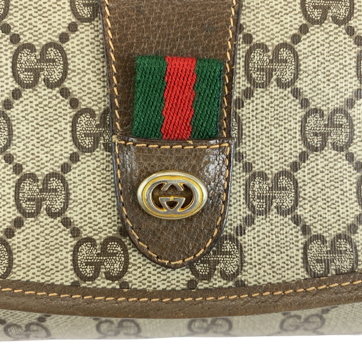 14293
GUCCI グッチ シェリーライン オールドグッチ ブラウン  ゴールド金具 PVC / レザー 156 01 030 クラッチバッグ セカンドバッグ  レディース