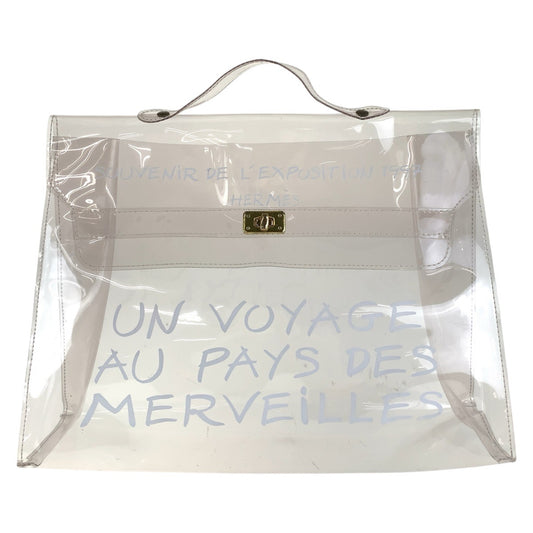 15584
 HERMES Kelly-style clear gold hardware vinyl handbag for women