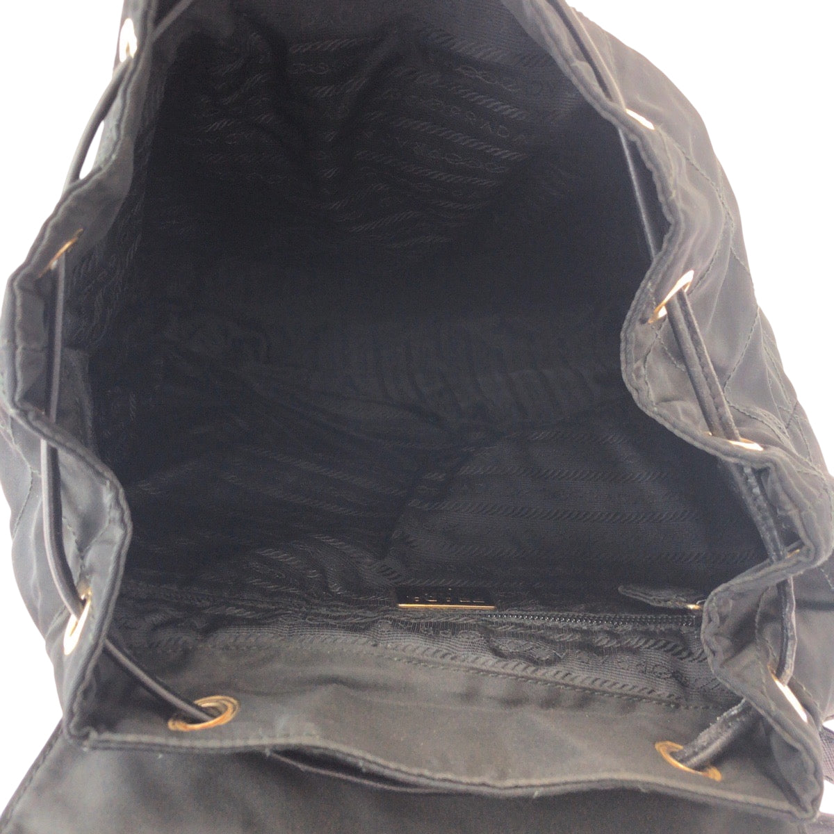 16508
PRADA プラダ ヴィンテージ テスート 三角ロゴプレート ブラック 黒 ゴールド金具 ナイロン k2919 リュックサック バックパック  レディース AB46