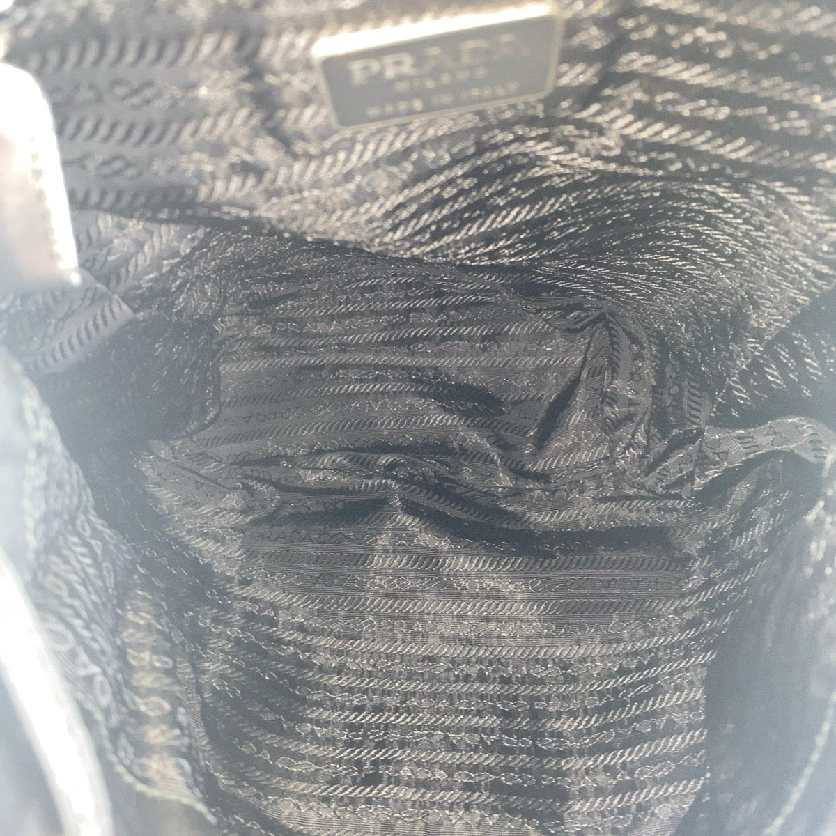 16895
PRADA プラダ テスート 三角ロゴプレート ブラック 黒 シルバー金具 ナイロン バックパック リュック  レディース ABP52