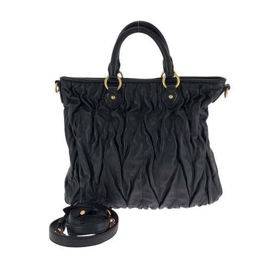 16986
Miu Miu ミュウ ミュウ マテラッセ ブラック 黒 ゴールド金具 レザー ショルダーバッグ ハンドバッグ 2way  レディース ABP56