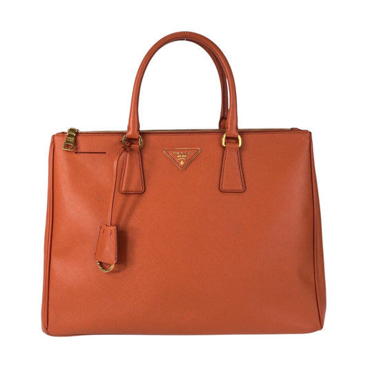 17072
PRADA プラダ サフィアーノ オレンジ ゴールド金具 レザー トートバッグ ハンドバッグ  レディース ABP63