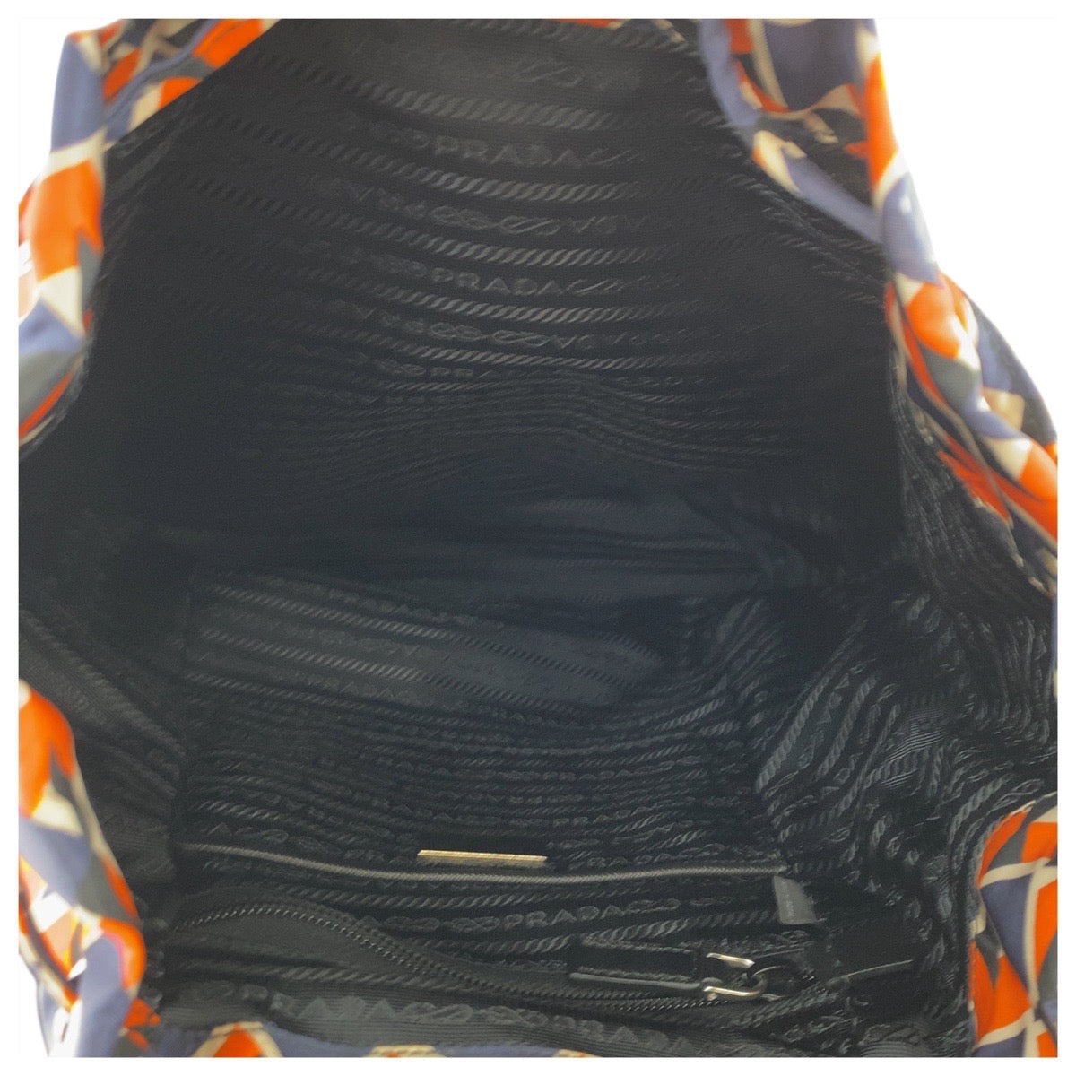 18211
PRADA プラダ テスート 三角ロゴプレート オレンジ ネイビー シルバー金具 ナイロン / レザー リュック バックパック レディース A62