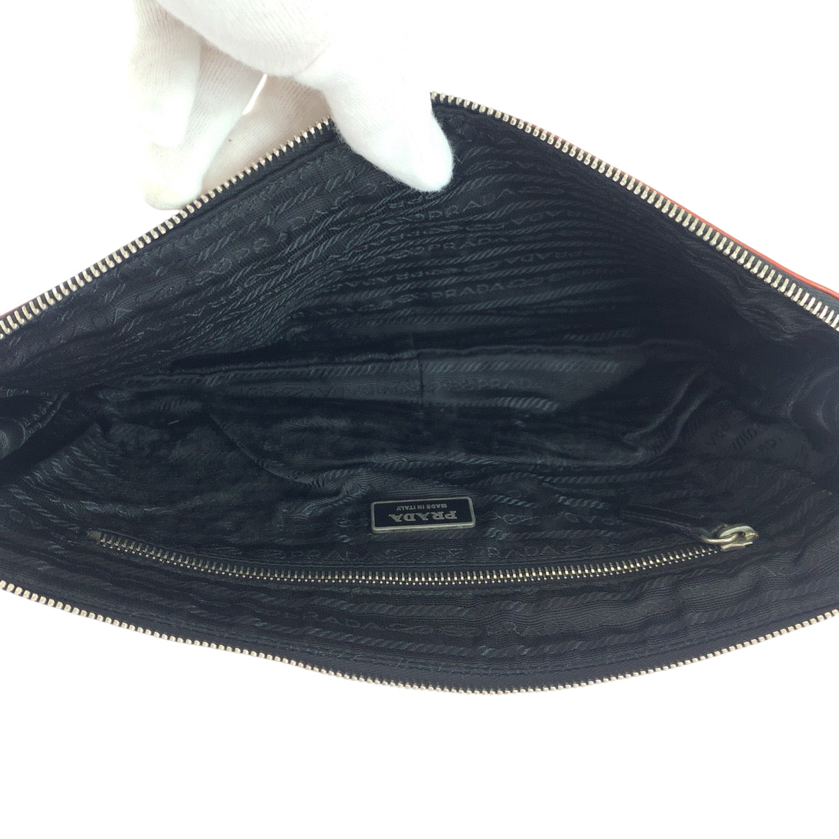 18637
PRADA プラダ 三角ロゴプレート 男女兼用 ブラック オレンジ シルバー金具 レザー クラッチバッグ セカンドバッグ レディース ABP22