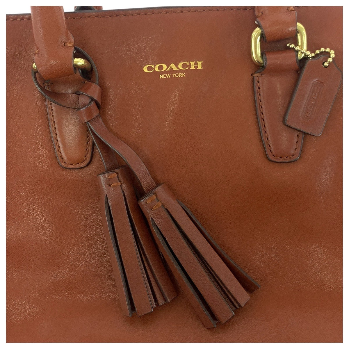 18777
COACH コーチ タッセル ブラウン ゴールド金具 レザー トートバッグ ハンドバッグ  レディース AB6