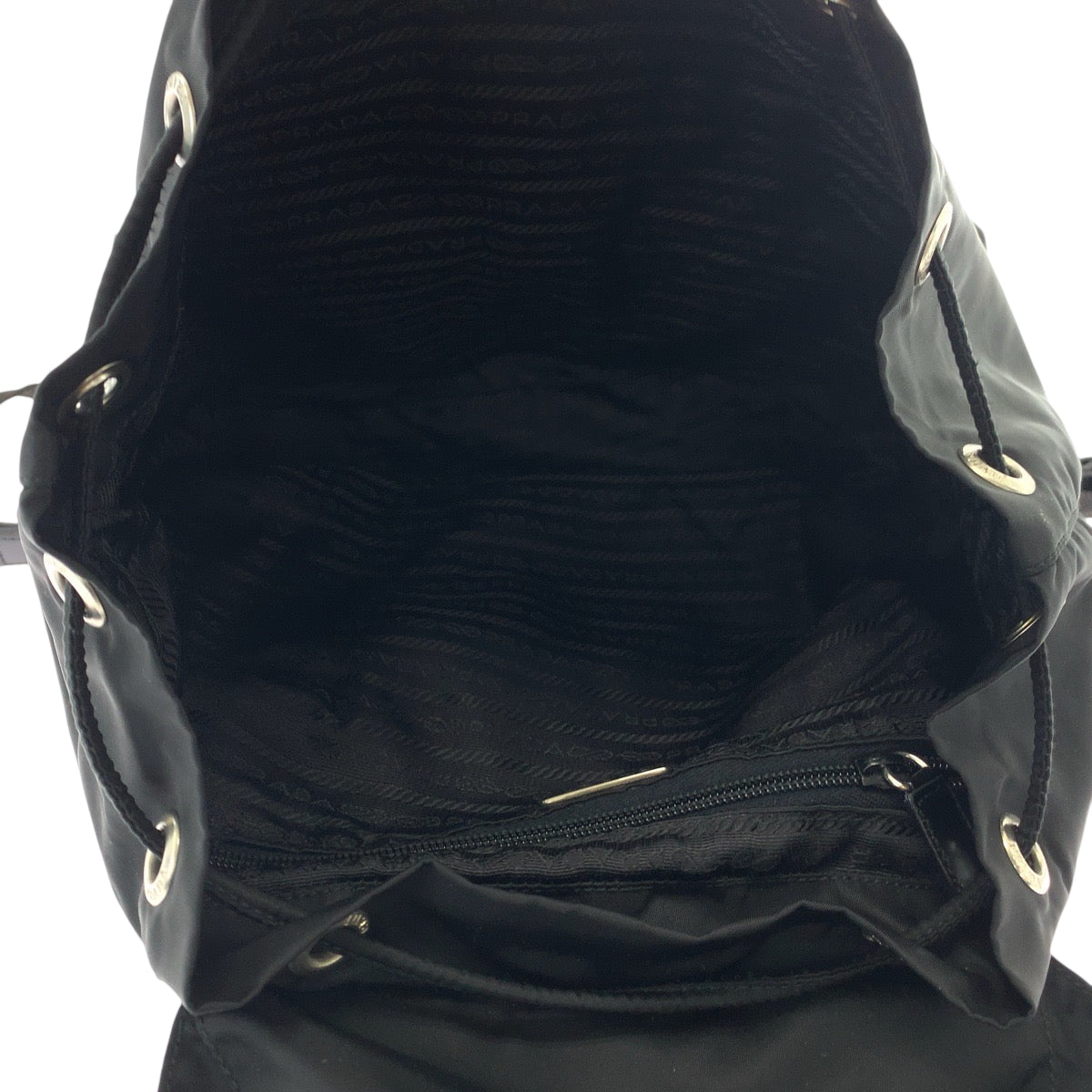 19127
PRADA プラダ テスート 三角ロゴプレート ブラック 黒 シルバー金具 ナイロン リュックサック バックパック  レディース ABP45