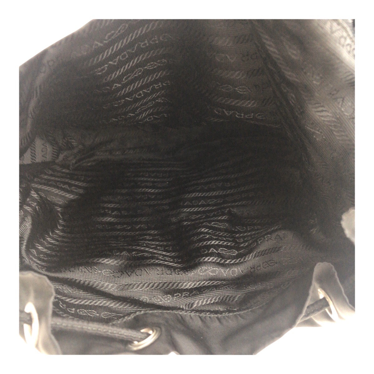 19145
PRADA プラダ テスート 三角ロゴプレート ブラック 黒 シルバー金具 ナイロン リュックサック バックパック  レディース A50