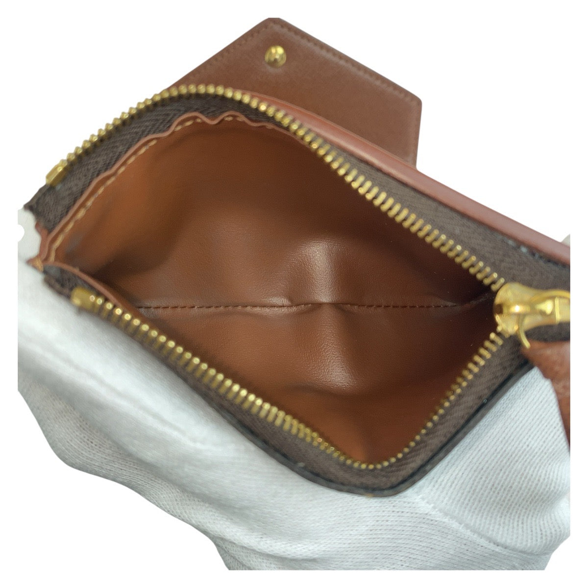 19233
LOUIS VUITTON ルイヴィトン モノグラム ポルトフォイユ ヴィクトリーヌ ブラウン ゴールド金具 PVC M62472 折財布 コンパクトウォレット レディース ABP31