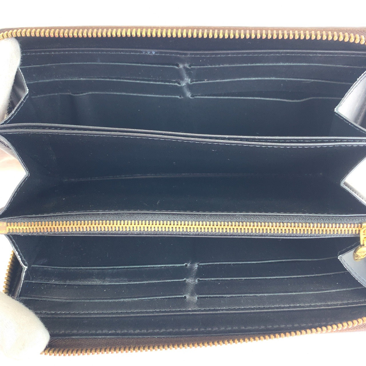 19643
LOUIS VUITTON ルイヴィトン モノグラム トランクタイム ジッピーウォレット 男女兼用 ブラウン ゴールド金具 モノグラムキャンバス M52746 長財布 ラウンドファスナー レディース AB60