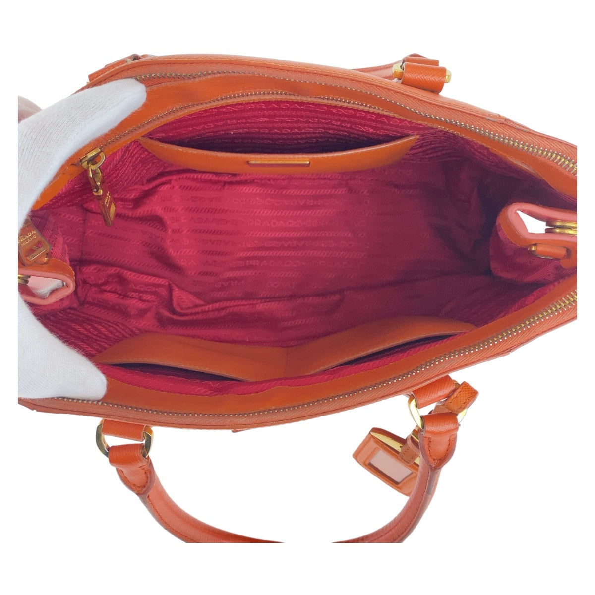 19656
PRADA プラダ サフィアーノ 三角ロゴプレート オレンジ レッド バイカラー ゴールド金具 レザー ハンドバッグ トートバッグ レディース AB56