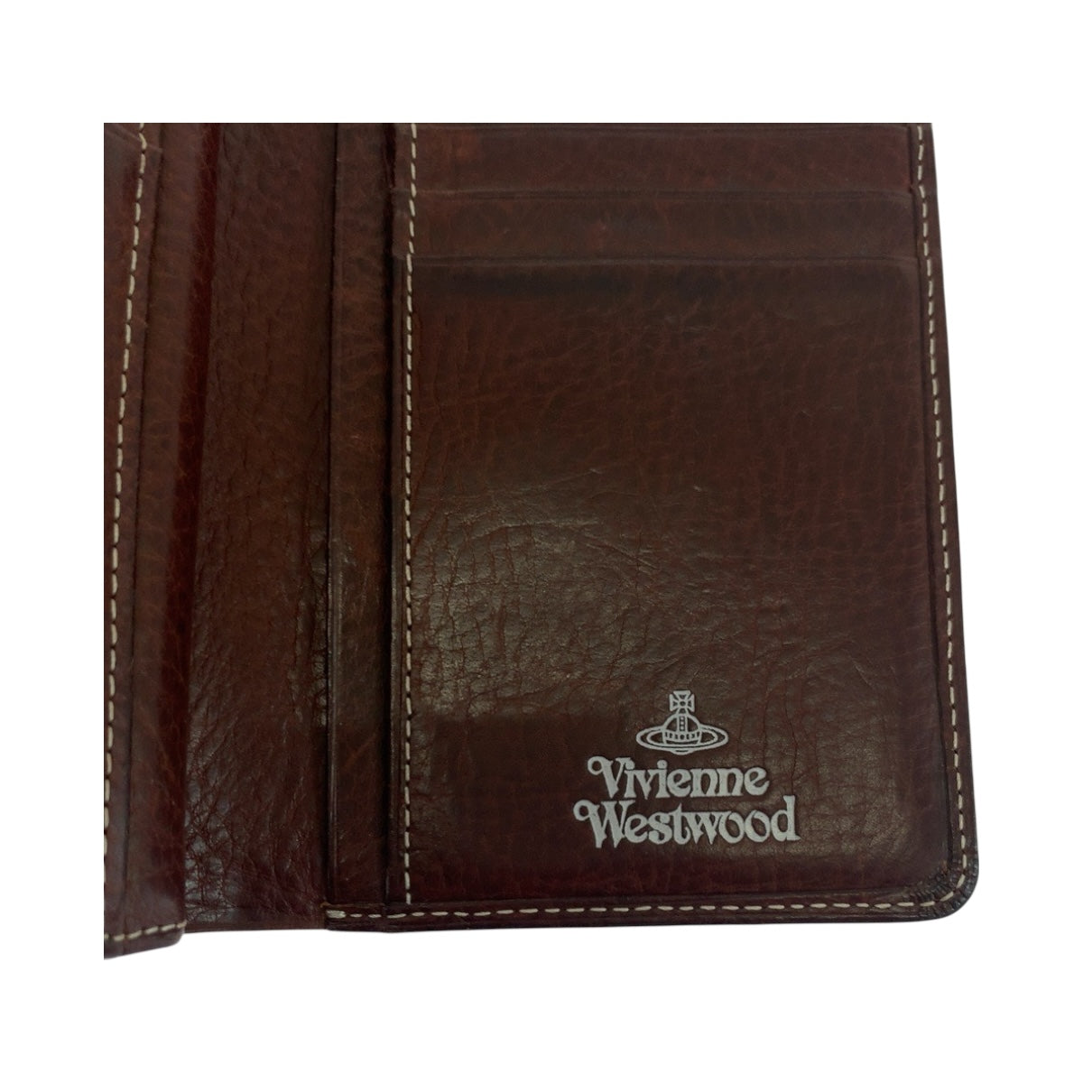 19679
Vivienne Westwood ヴィヴィアンウエストウッド 総柄 ブラウン マルチカラー シルバー金具 キャンバス 折財布 コンパクトウォレット  レディース ABP11