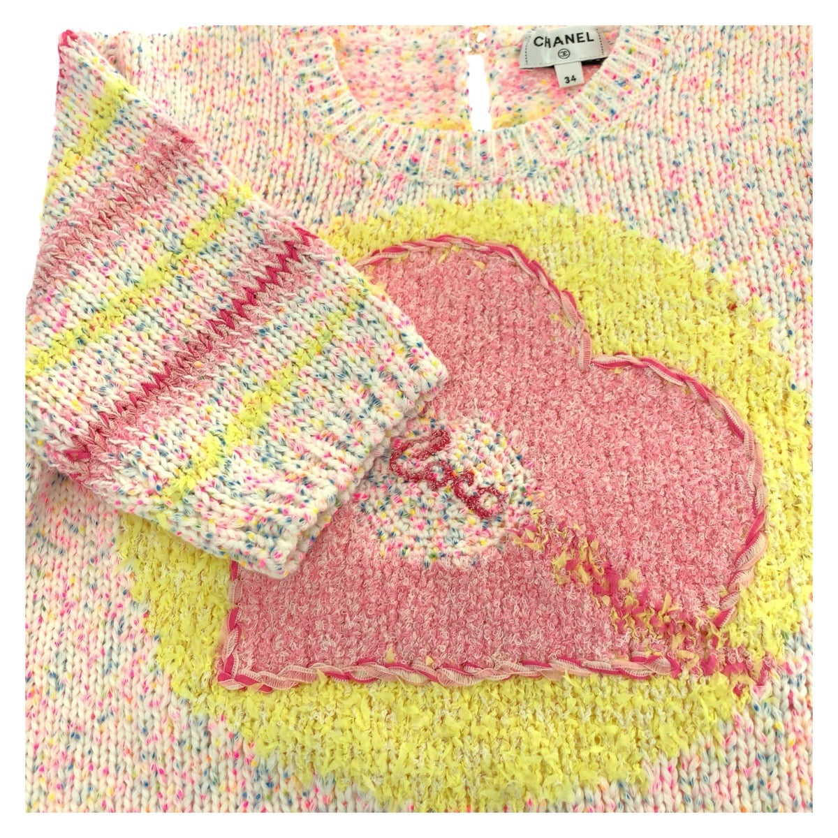 19697
CHANEL シャネル 24SS ハートモチーフ ココマーク サイズ34 ピンク イエロー ウール P76579K11042 短丈 半袖ニット 半袖シャツ カットソー レディース SA257