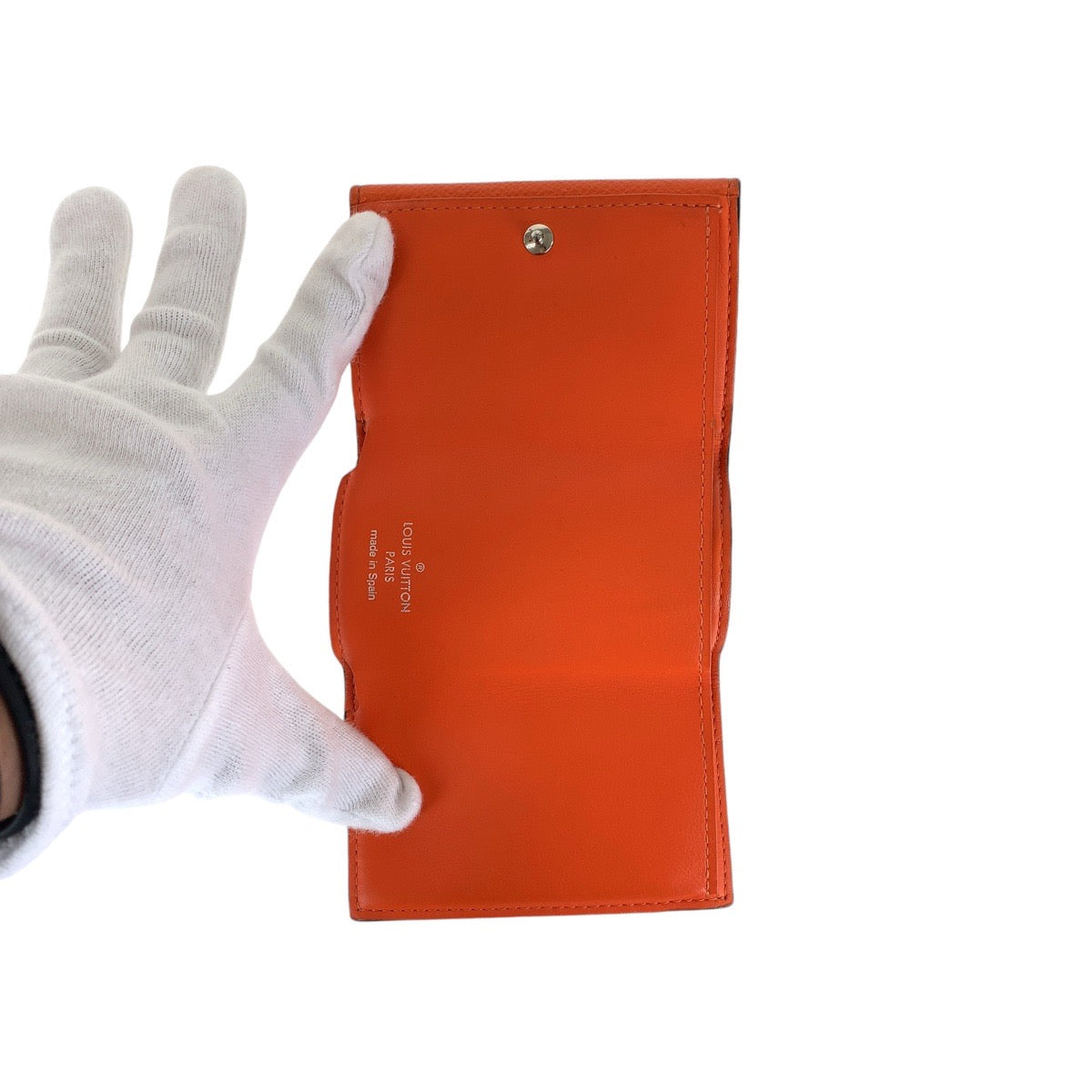 19865
LOUIS VUITTON ルイヴィトン タイガラマ モノグラム ディスカバリー コンパクトウォレット ボルケーノオレンジ シルバー金具 レザー M69245 折財布 コンパクトウォレット レディース AB28