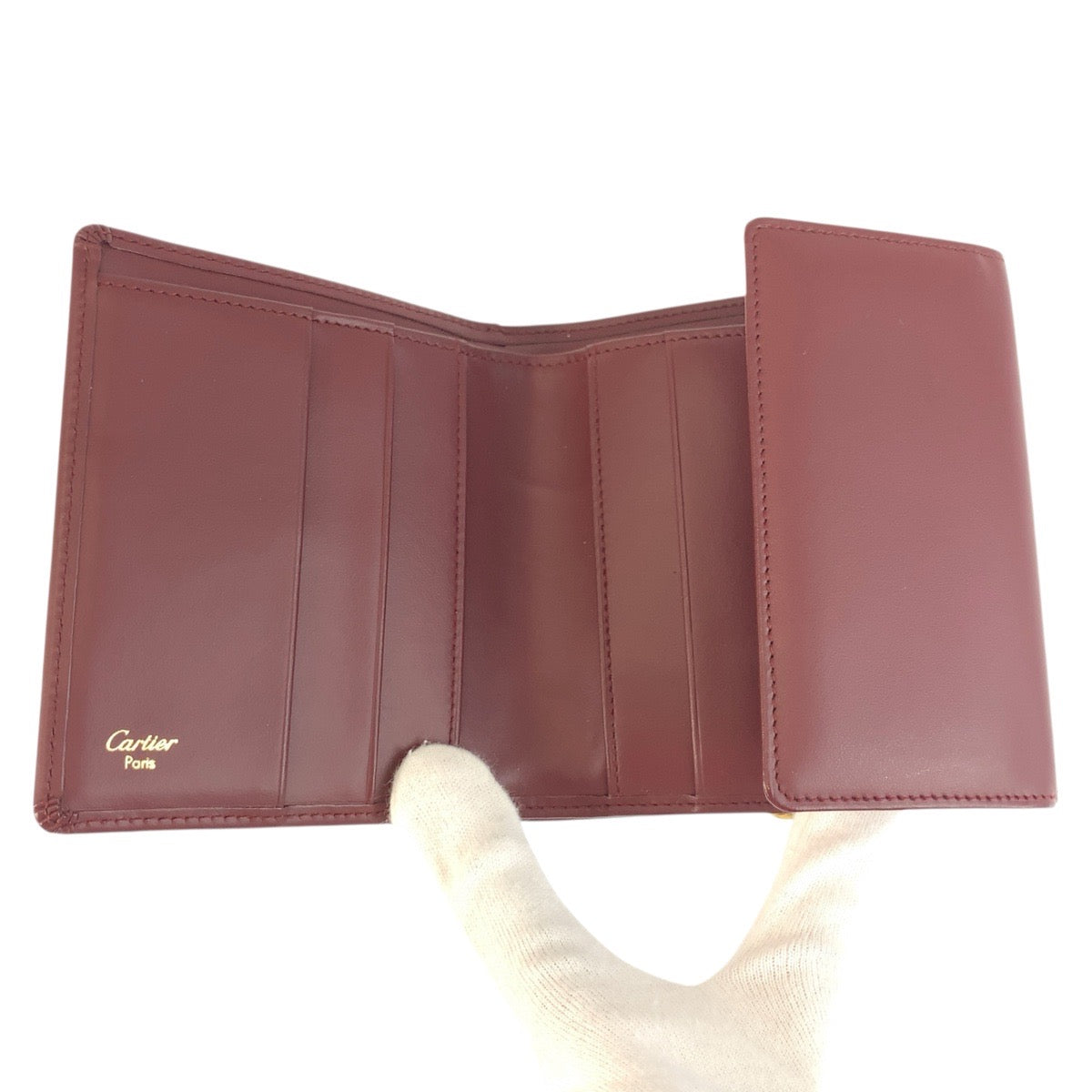 20752
CARTIER カルティエ マストライン ボルドー ゴールド金具 レザー 折財布 コンパクトウォレット レディース SA28