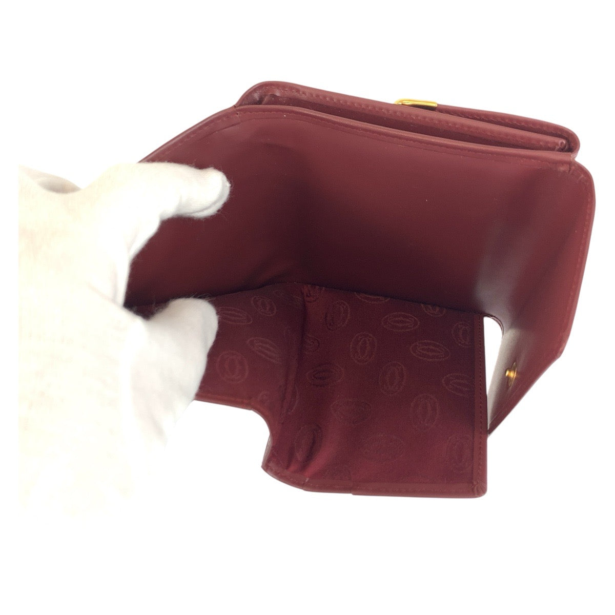 20752
CARTIER カルティエ マストライン ボルドー ゴールド金具 レザー 折財布 コンパクトウォレット レディース SA28