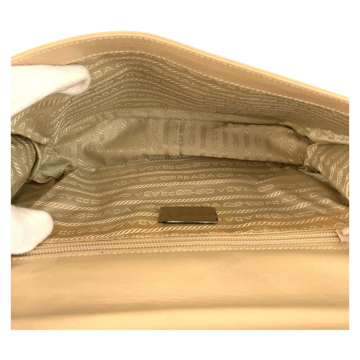 20886
PRADA プラダ ロゴ ベージュ レザー / プラスチック 77 ショルダーバッグ レディース ABP32