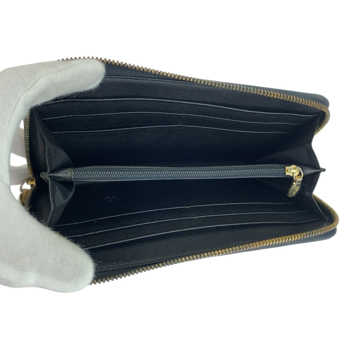 20917
MCM エム シー エム ヴィセトス スタッズ ブラウン キャメル ゴールド金具 レザー 10151306 長財布 ロングウォレット メンズ AB11