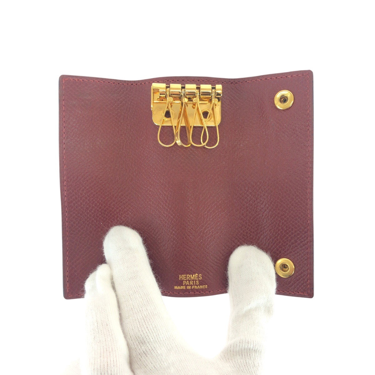 21067
HERMES エルメス ワインレッド ボルドー ゴールド金具 レザー キーケース 4連 男女兼用 レディース ABP20