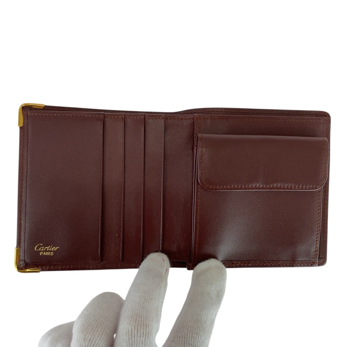 21314
CARTIER カルティエ マストライン ワインレッド ゴールド金具 レザー 折り財布 コンパクトウォレット 男女兼用 レディース ABP9