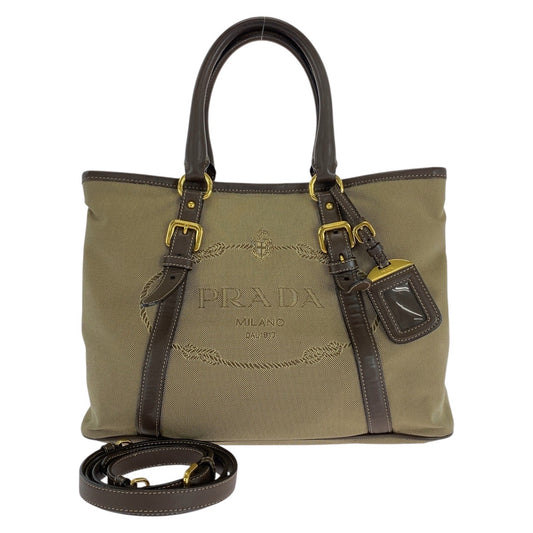 21751
PRADA プラダ ロゴジャガード 三角ロゴプレート カーキ ブラウン ゴールド金具 キャンバス / レザー トートバッグ ショルダーバッグ レディース ABP46