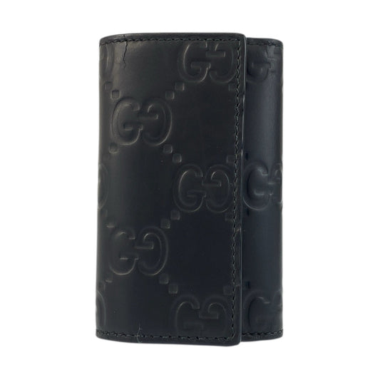 21957
GUCCI グッチ ラバーエフェクト ブラック 黒 レザー 771312 キーケース 6連 メンズ ABP20