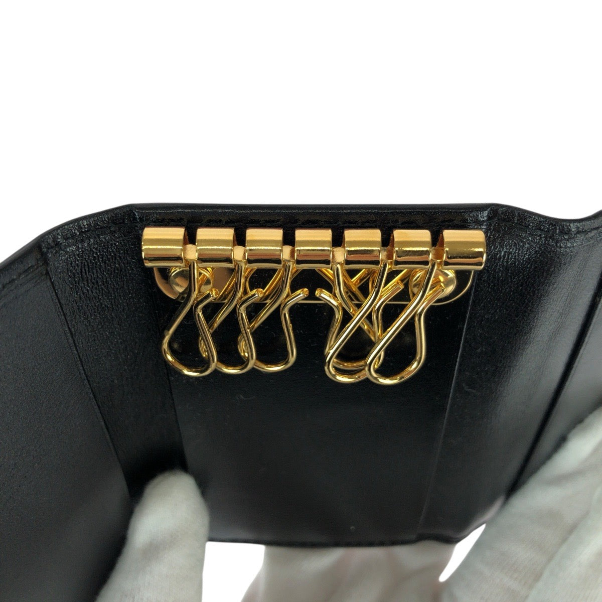 21997
CARTIER カルティエ パシャ ドゥ カルティエ ブラック 黒 ゴールド金具 レザー キーケース 6連 男女兼用 メンズ SA14