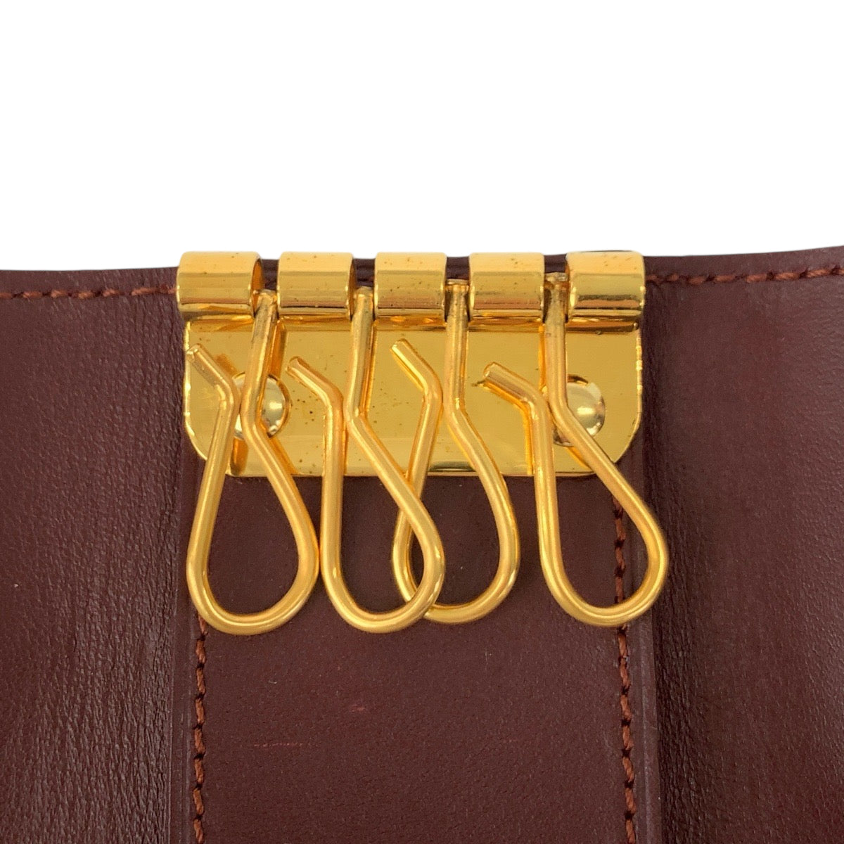 22449
CARTIER Cartier Must Line 4-Key Holder Wine Red Bordeaux Gold Hardware Leather Key Case Ladies A5