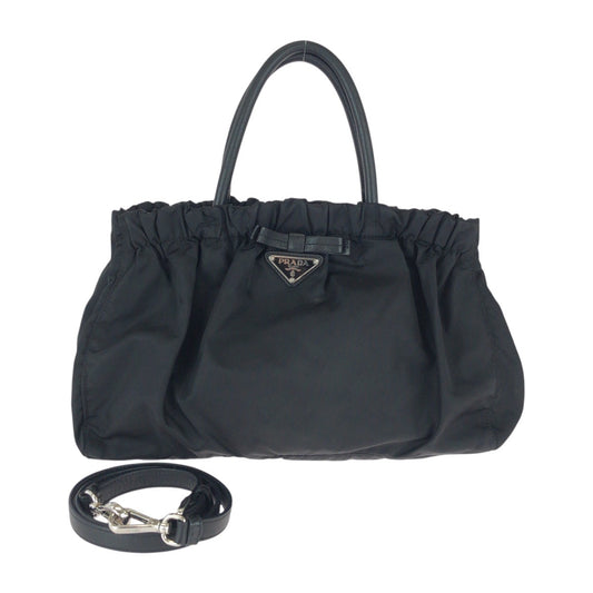 22742
PRADA プラダ テスート 三角ロゴプレート ブラック 黒 シルバー金具 ナイロン / レザー トートバッグ ハンドバッグ ショルダーバッグ レディース ABP42