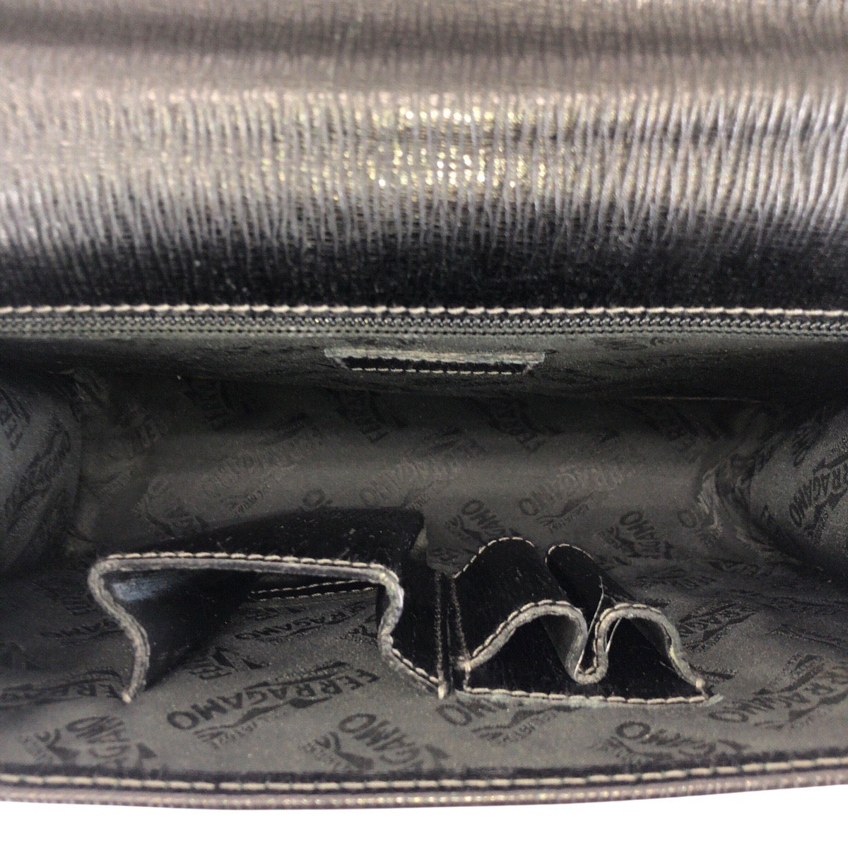 23278
Salvatore Ferragamo サルヴァトーレフェラガモ ダイヤルロック式 ブラック 黒 シルバー金具 レザー クラッチバッグ セカンドバッグ メンズ A28