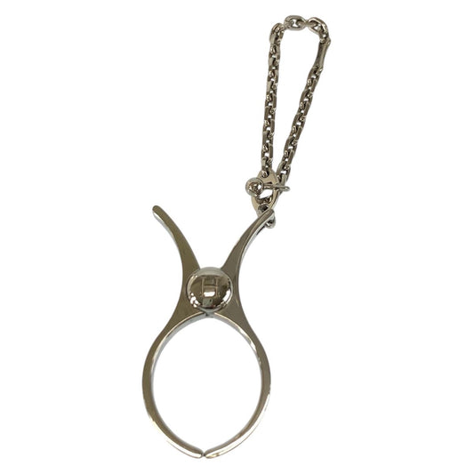 23475
HERMES エルメス フィルー シルバー メタル 手袋ホルダー レディース A23