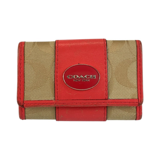 23558
COACH コーチ シグネチャー ベージュ ピンク シルバー金具 キャンバス / レザー F54421 キーケース 6連 レディース AB2