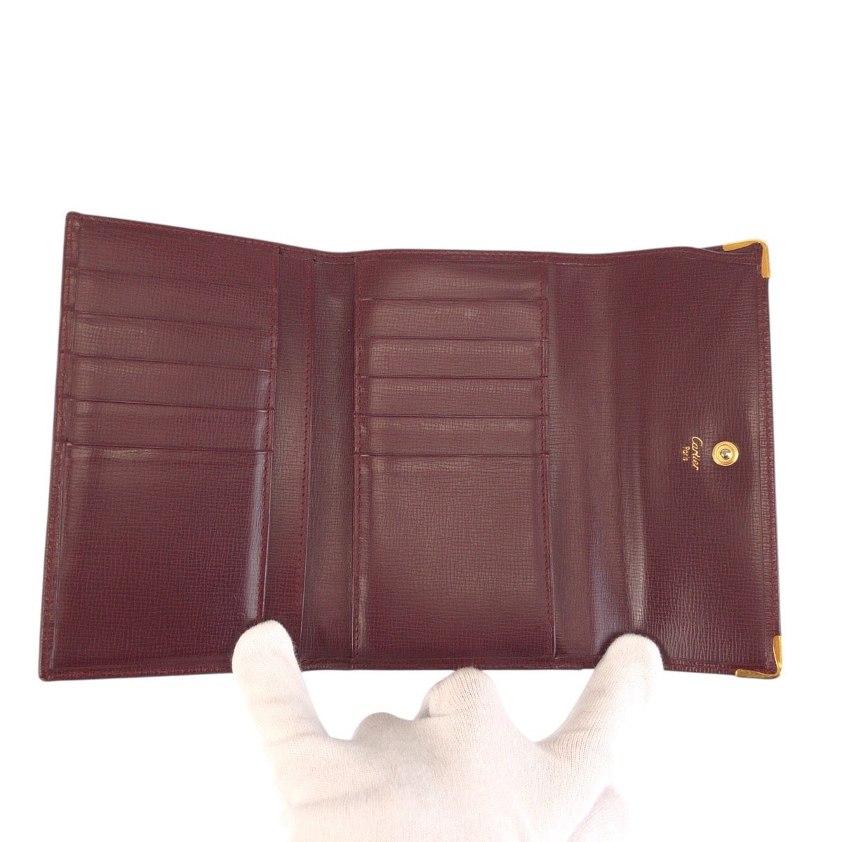 23708
CARTIER カルティエ マストライン ワインレッド ボルドー ゴールド金具 レザー 折り財布 コンパクトウォレット レディース ABP21