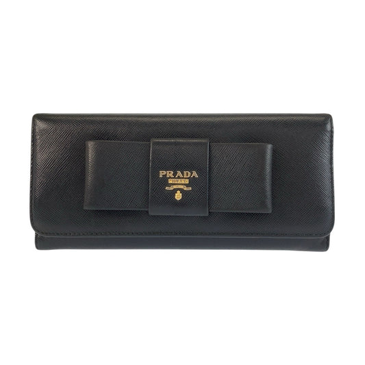23873
PRADA プラダ サフィアーノ フィオッコ リボン ブラック 黒 ゴールド金具 レザー 長財布 ロングウォレット レディース ABP21