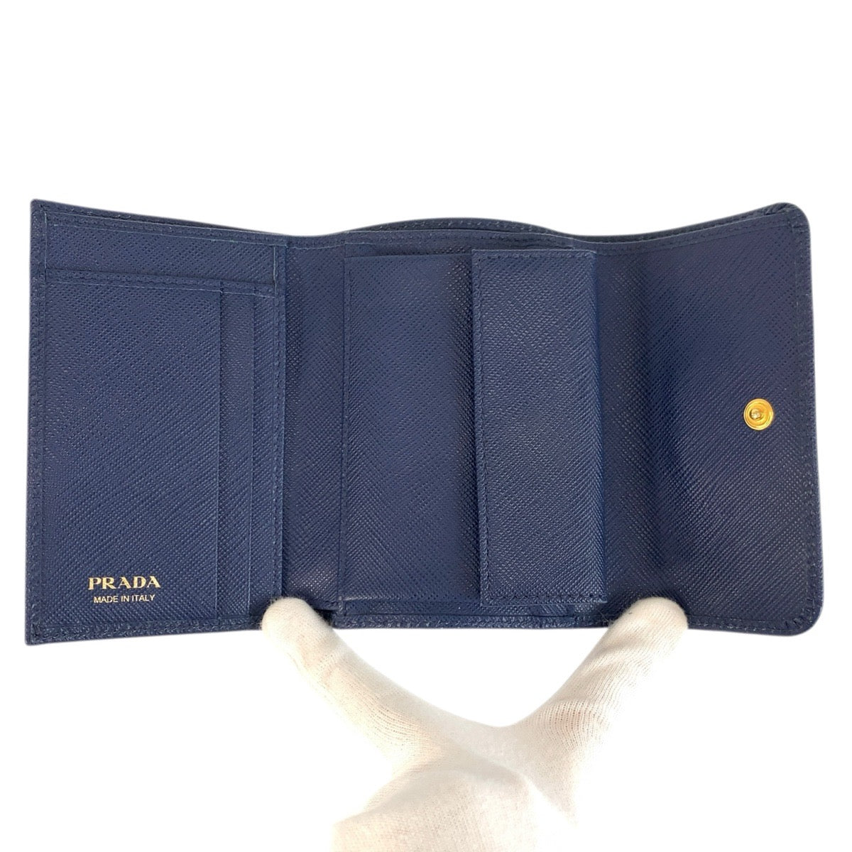 23874
PRADA プラダ サフィアーノ フィオッコ リボン ネイビー ゴールド金具 レザー 折り財布 コンパクトウォレット レディース AB21