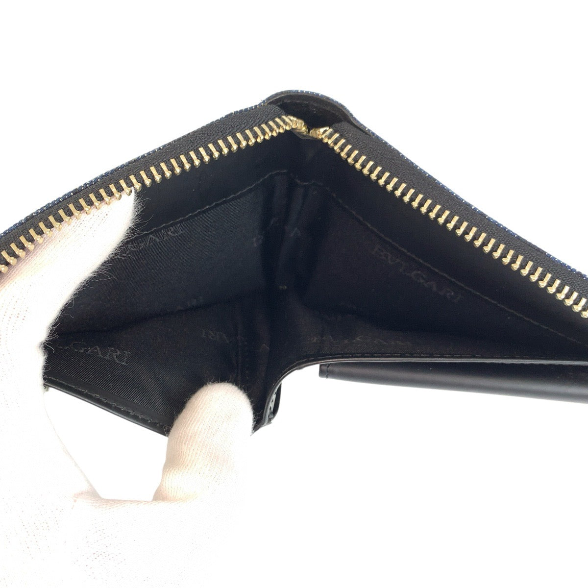 23899
BVLGARI ブルガリ ロゴマニア ブルー ブラック シルバー金具 デニム / レザー 折り財布 コンパクトウォレット レディース ABP21